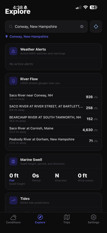 Free Radical Explore tab showing river flow, swell, and tides